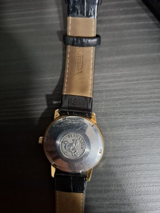 Omega złoto,stal