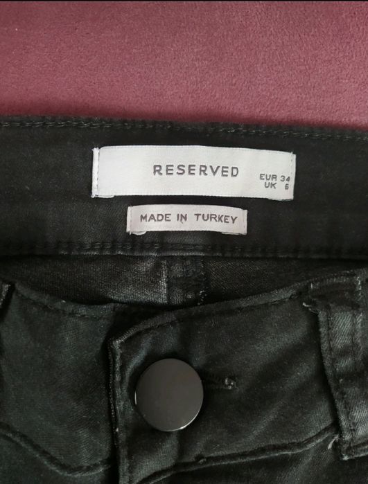 Spodnie Reserved z haftem 34