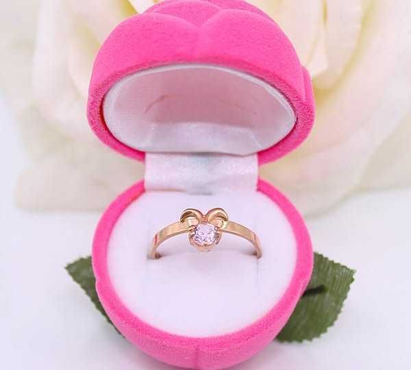 Złoty pierścionek p.585/2,52g z fioletowym kamieniem