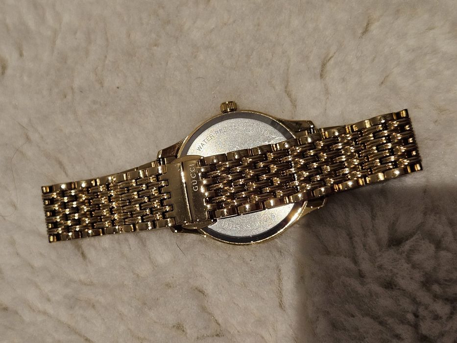 Relógio Gucci dourado