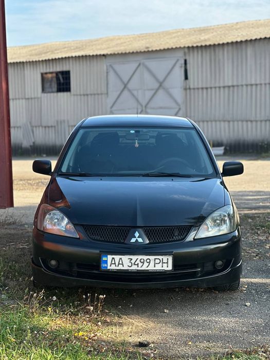 Продам Митсубиси Лансер