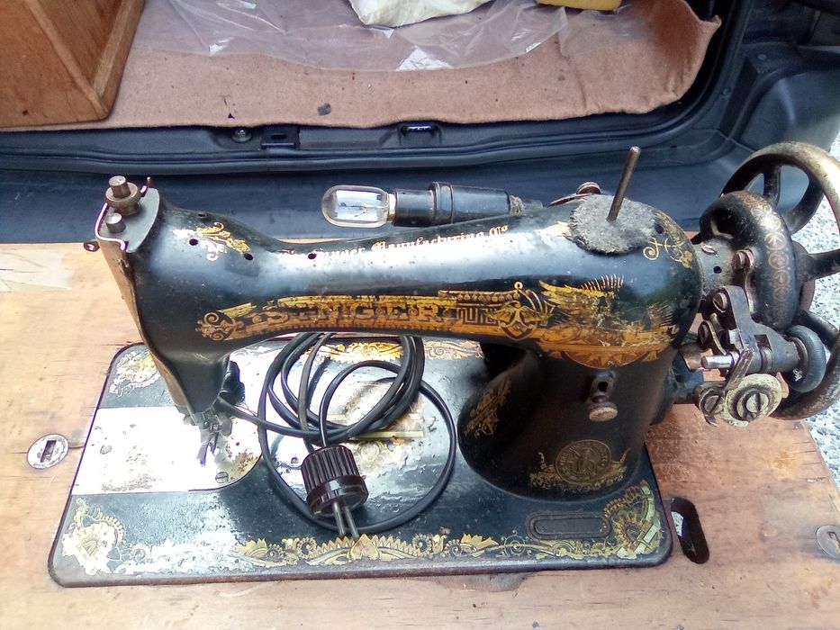 Máquina de costura singer
