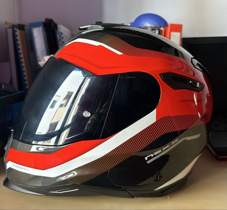 Vendo 2 conjuntos de Capacetes e Blusões para mota