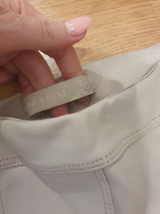 Spodnie beżowe kremowe skóra lateks rurki zasuwane S 36