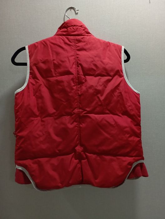 Червона  жилетка