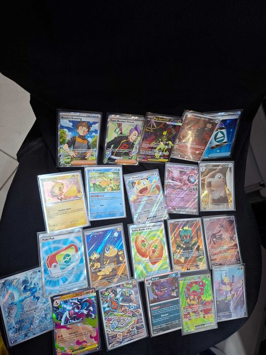 Karta Pokemon Team Rocket's Meowth 203/182 DRI