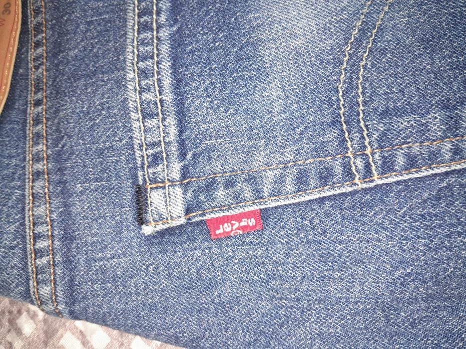 Calças levi's 502 portes grátis