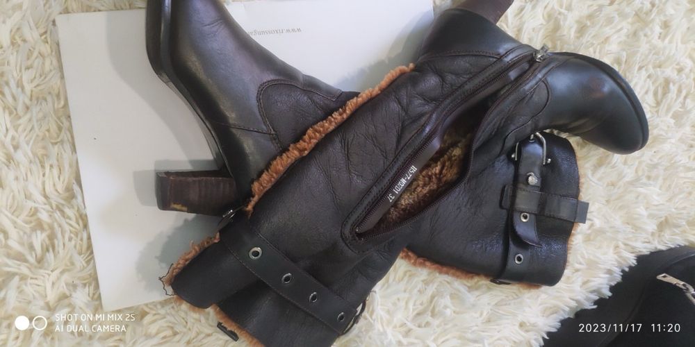 Зимові високі чоботи на підборах з натуральної шкіри