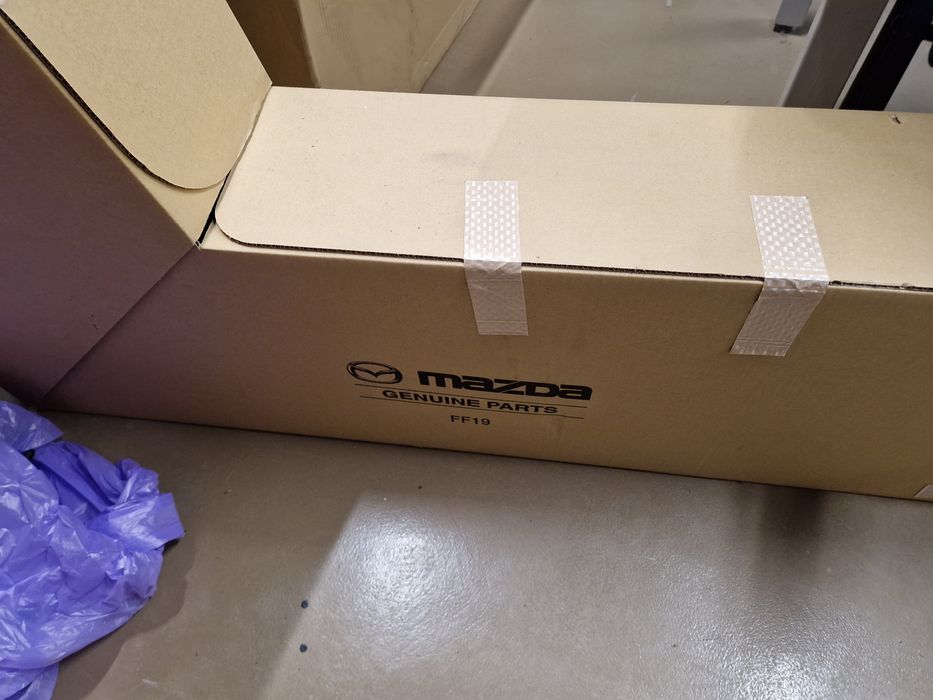 Крило переднє ліве  Mazda CX9   Оригінал TK4852211G