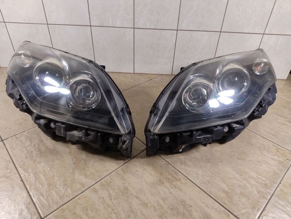 Renault Laguna 3 III lampa reflektor prawy lewy komplet Europa wysyłka