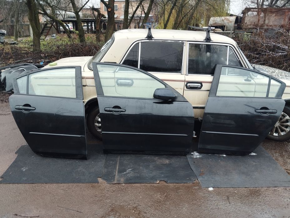 Двері Мазда 3 Mazda 3