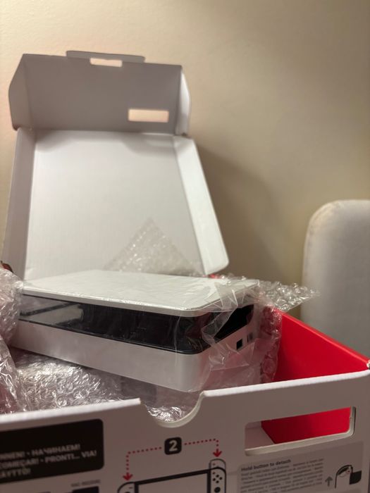 Nintendo Switch Oled + jogo Mario + película + estojo de transporte