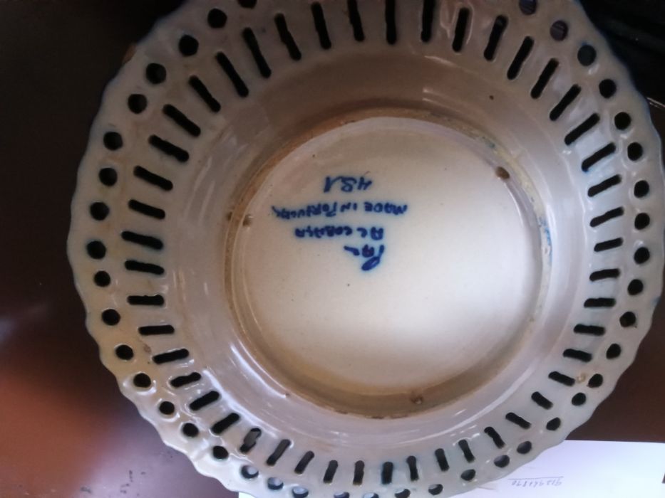 Selling decorative plates.446819132695521284
