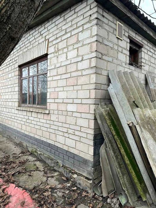 Пів будинку в центрі Баришівки