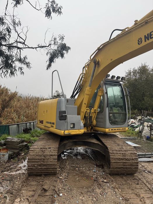 Giratoria new holland e145 em bom estado
