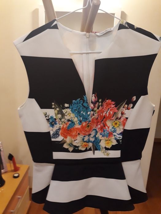 Blusa Nakuro, em estado muito bom. Está  como nova