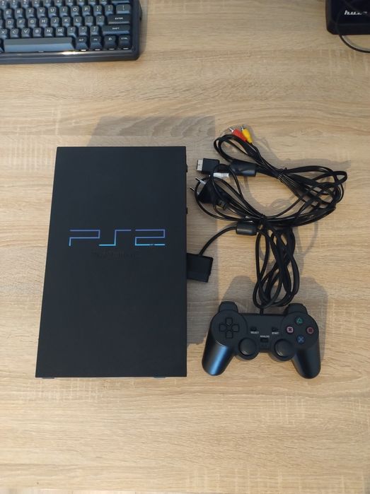 PlayStation 2 Slim + Pad + Kable