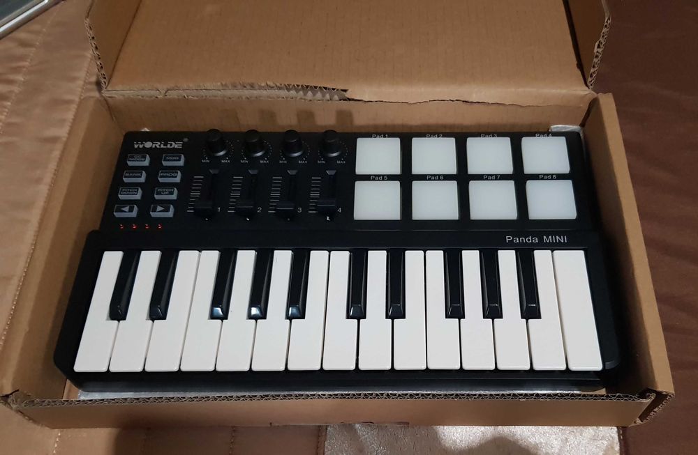 mini teclado musica WORLDE