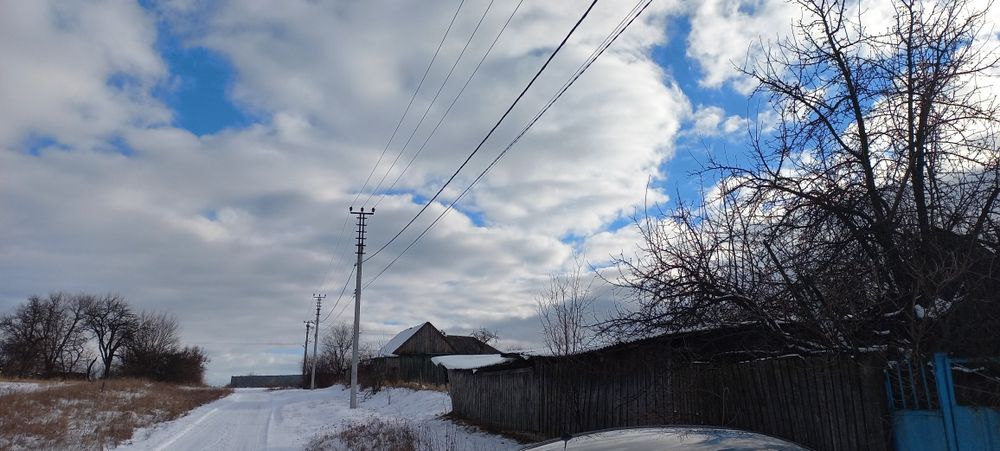 Продам пів будинка та земельну ділянку