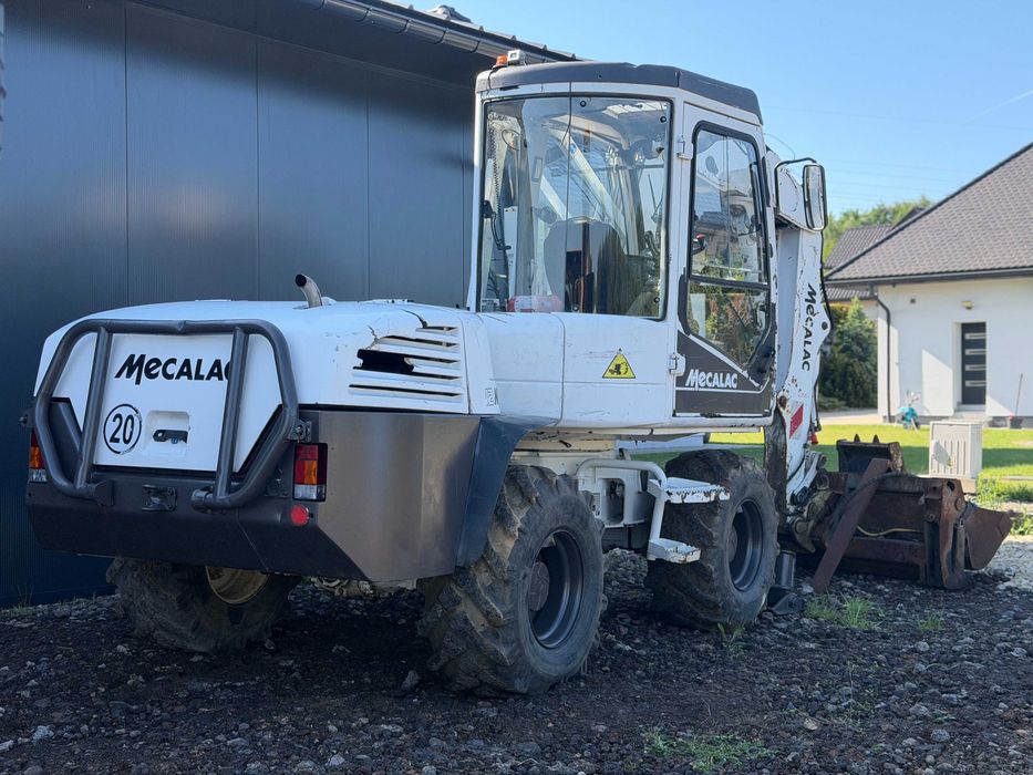 MECALAC 12 MTX (2009) – Stan Bardzo Dobry, Faktura VAT, serwisowana w ASO,