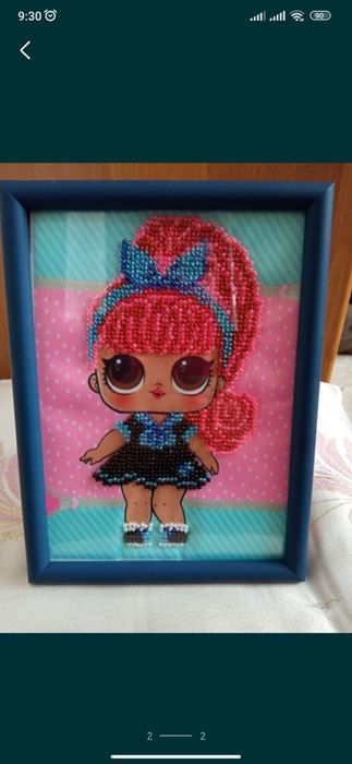 Вишита бісером кукла лол