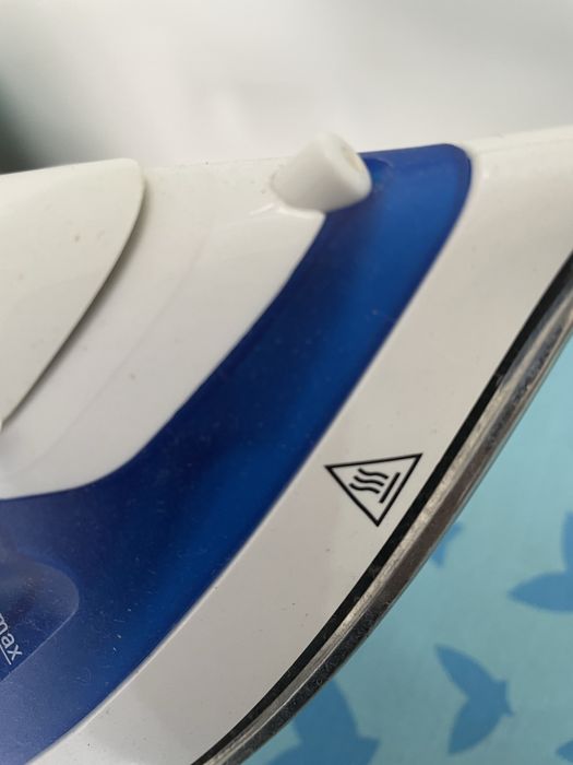 Ferro e tabua de passar