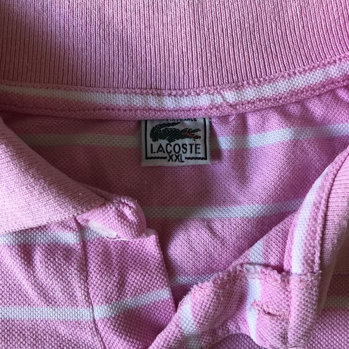 Поло Lacoste.