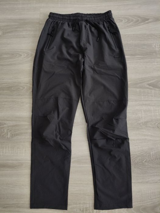 Sprzedam cienkie spodnie materiałowe Lacoste w rozmiarze  XL