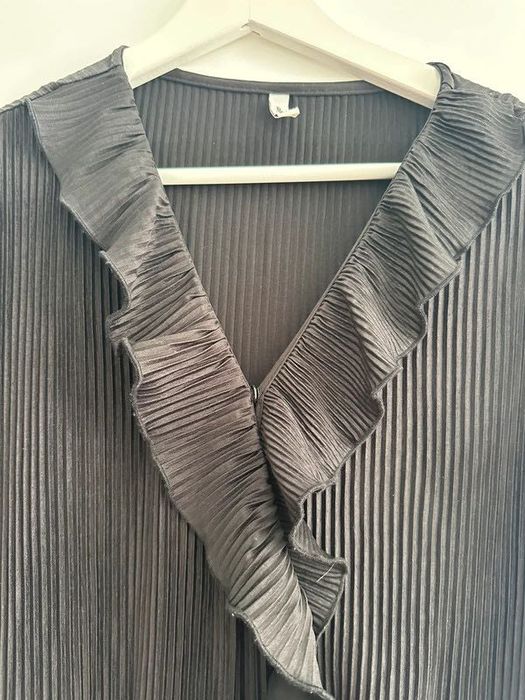 Czarny kombinezon Stradivarius