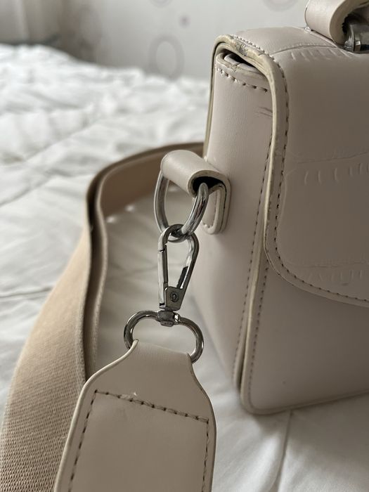 Сумка клатч в молочному кольорі