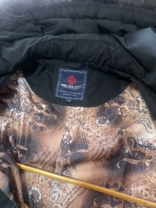 Пальто пуховик с чернобуркой на капюшоне