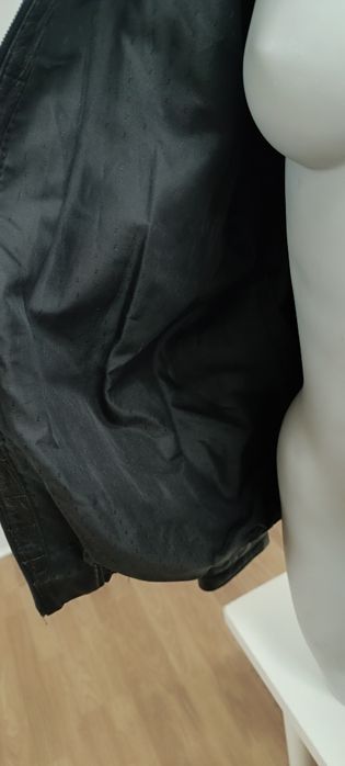 Black jacket, used. Size 50.64752274562818121