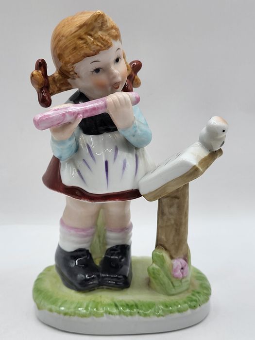 Porcelanowe figurki muzyków, 2 szt.