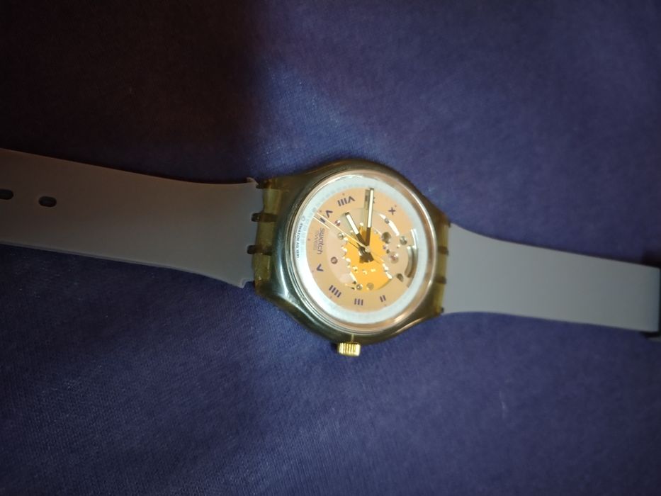 SWATCH  годинники.