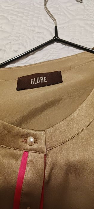 Blusa marca Globe,seda 100%,tam.34-36.  Cor castanho claro com arranjo