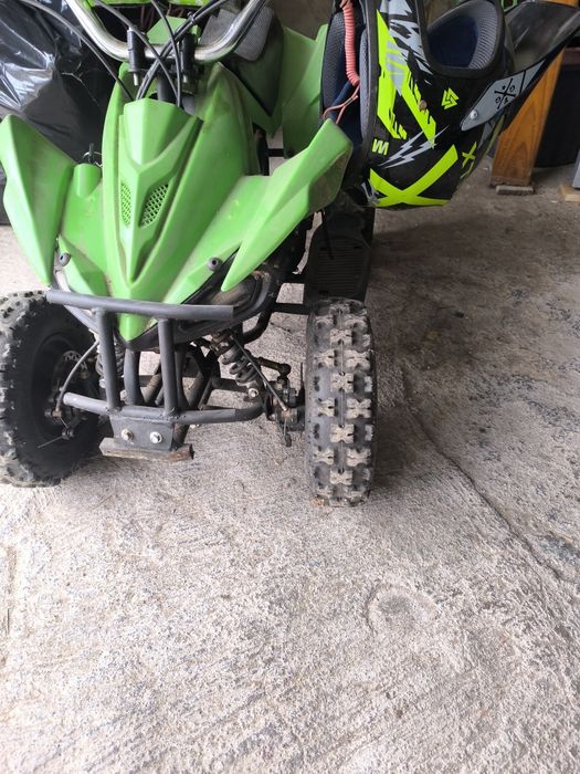 Moto 4 criança a gasolina