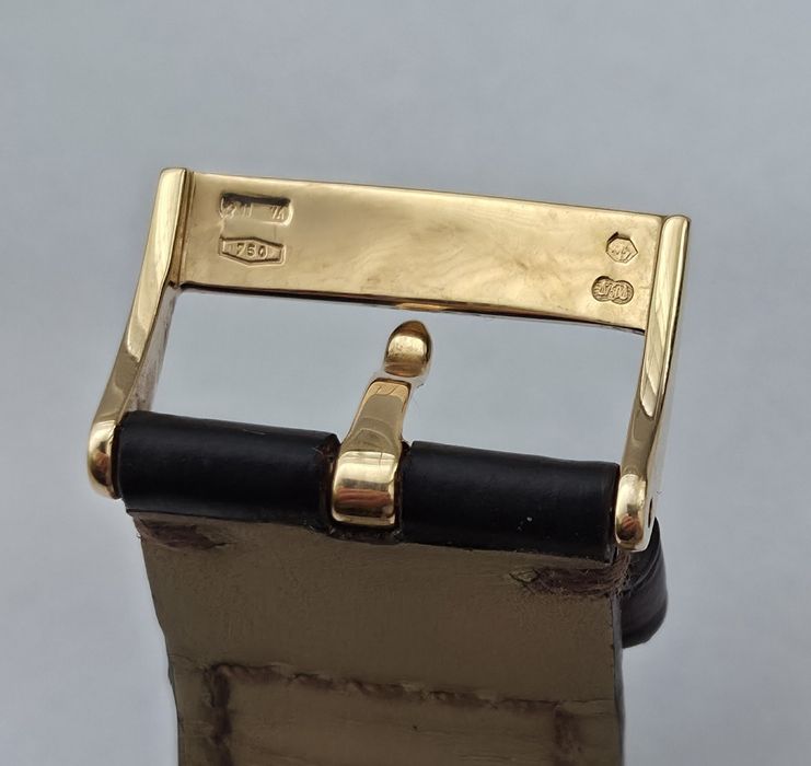 Швейцарскій годинник Omega De Ville