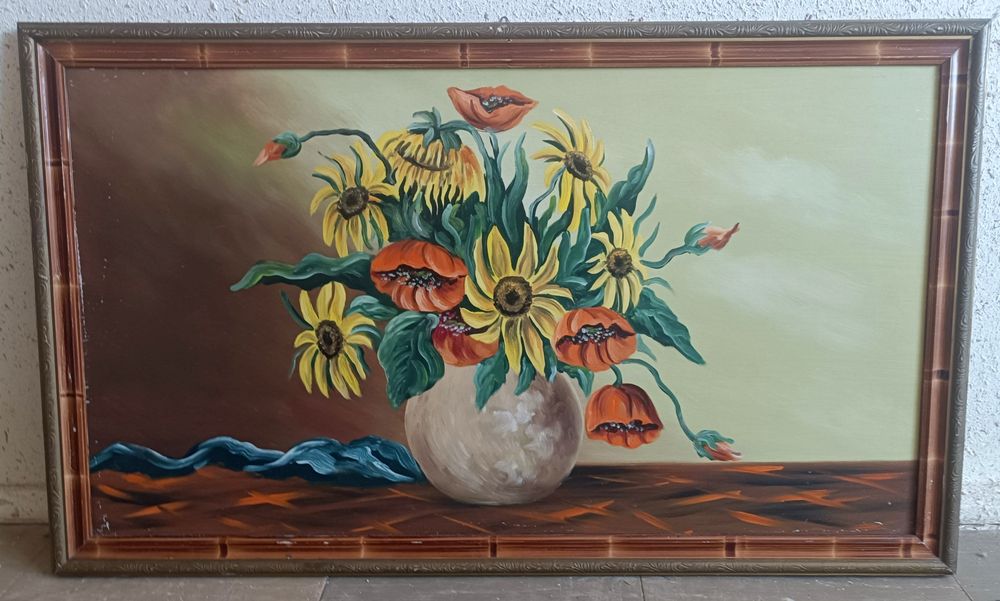 Obraz z pięknymi kwiatami w wazonie.