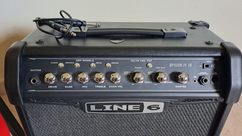 Guitarra eléctrica + amplificador