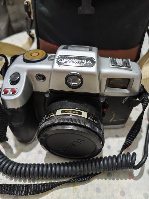 Máquina de fotografia da Olympia