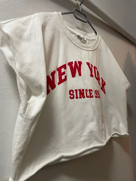 Luźna koszulka biała rozmiar M-XL do pępka