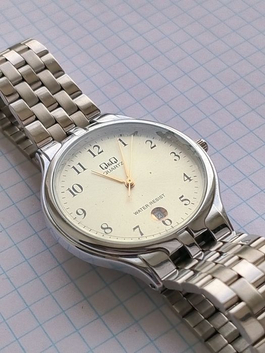 Наручные часы Q.Q