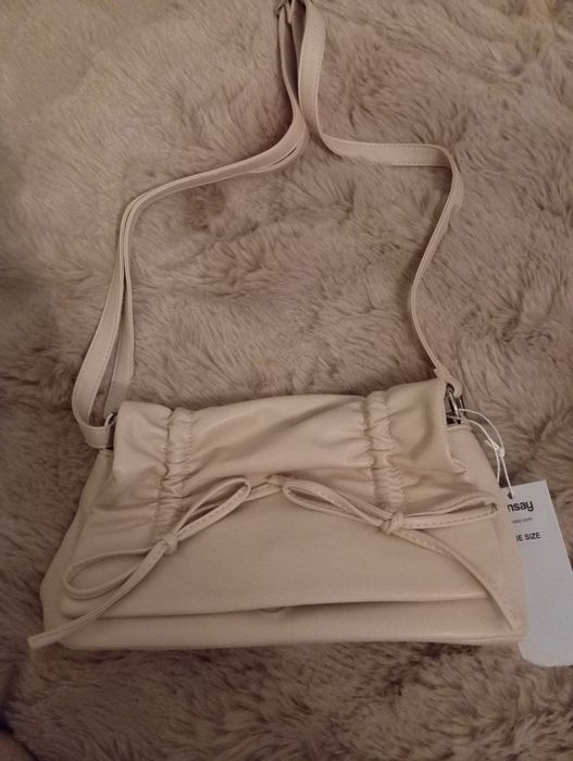 Пудрова сумка нова Sinsay