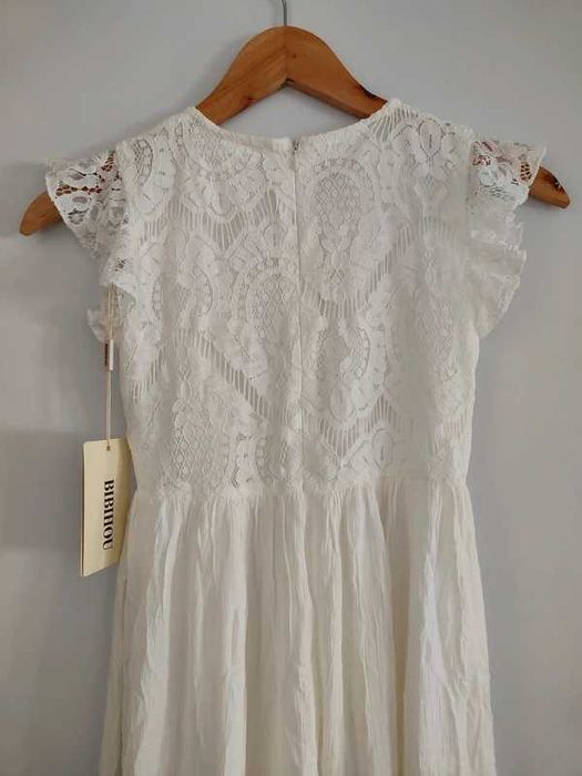 Vestido da marca Bibihou, concebido para uma criança  de 10 anos