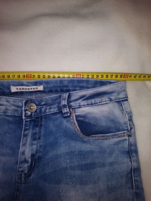 Spodnie jeans 40.        14