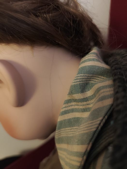 Boneca grande em porcelana.