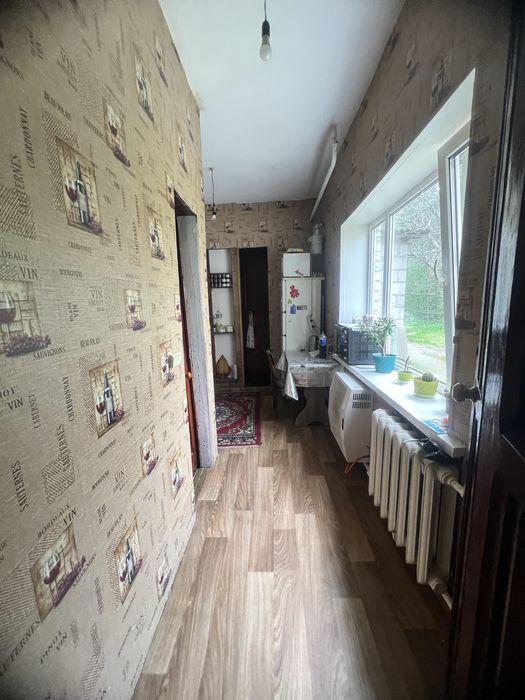 Жорнівка продаж пів будинку 4 кімнати Газ/Камін з виходом в Ліс