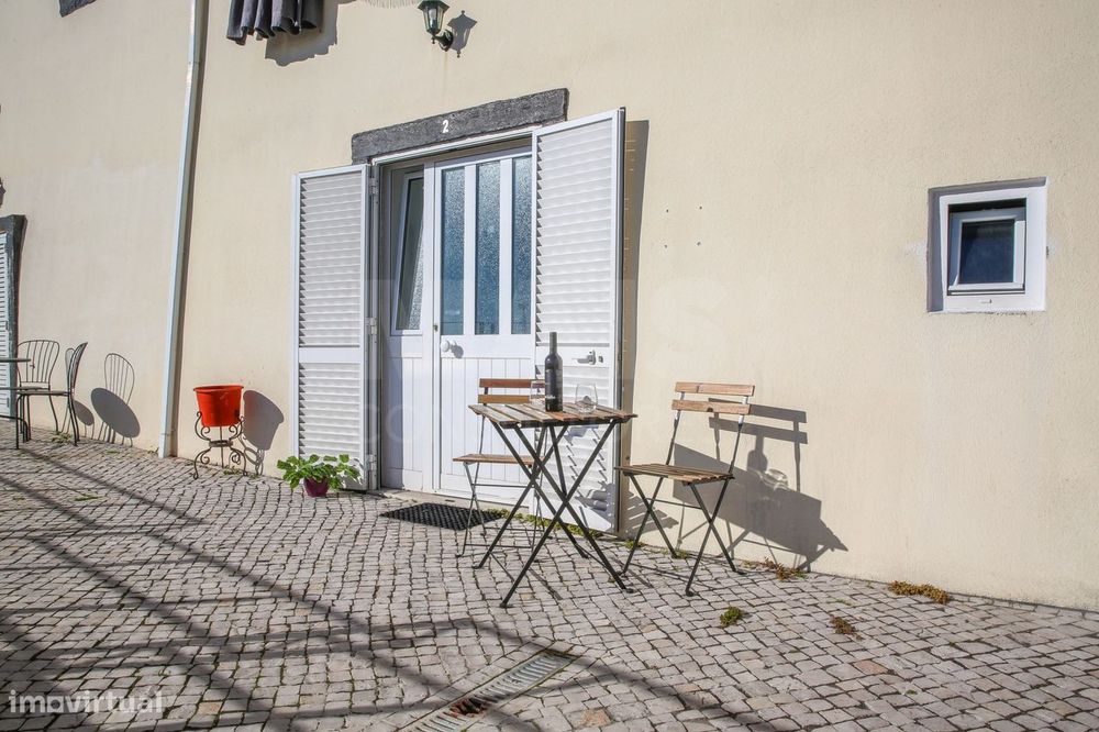 Apartamento com terraço e vista de rio