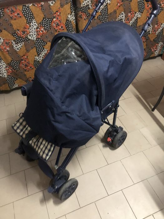 Carrinho de bebe c/ proteção marca chico
