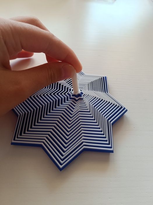 Um brinquedo anti-stress super giro, impresso numa impressora 3D.